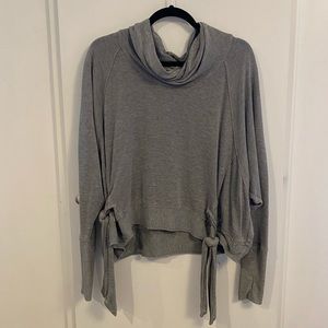 Free People Movement Relaxed Fit Sweatshirt with Tie Detail and Thumb Holes